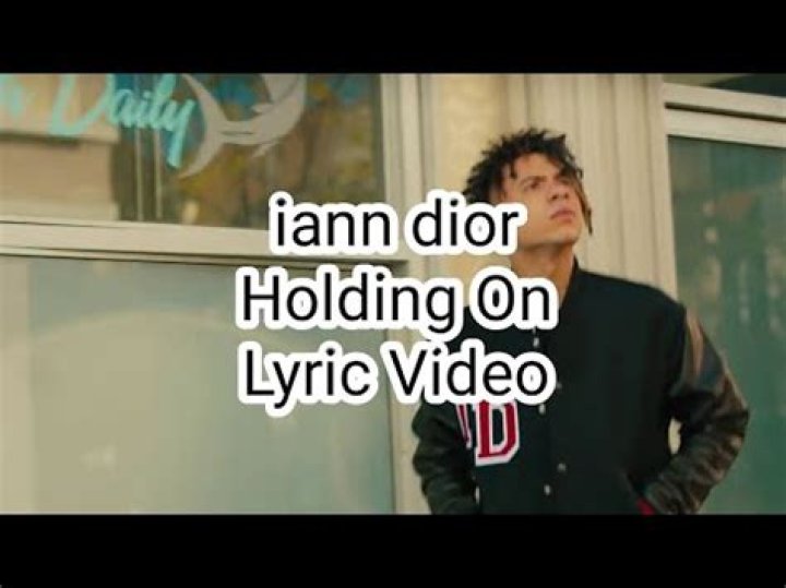 Lyrics & Translations of Holding On by Iann Dior